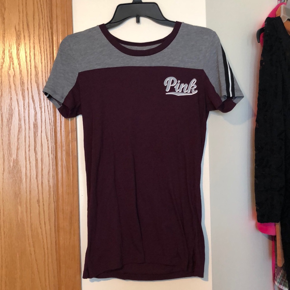 A maroon and grey Victoria’s Secret Pink top